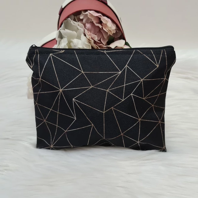 Geometriai mintás közepes méretű neszesszer